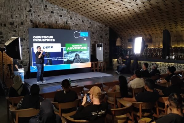 Irfan menjelaskan DXI 2026, kepada para tamu undangan dan wartawan. Foto: GPriority/Rizqi Juned