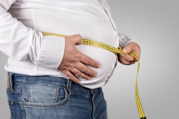 Ilustrasi orang memiliki masalah perut buncit/Foto iStock