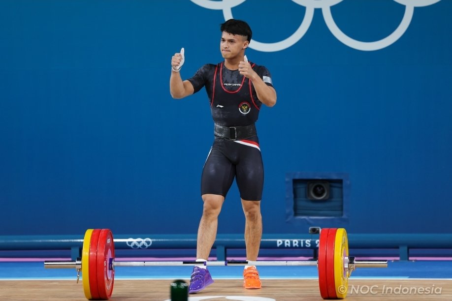 Atlet angkat besi, Rizky Juniansyah. Foto: NOC Indonesia