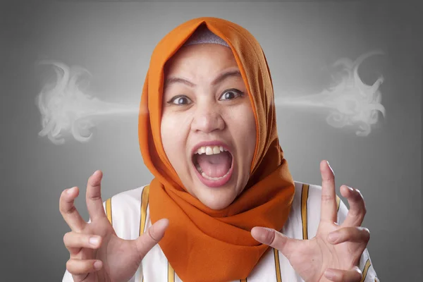 Ilustrasi muslimah yang sedang tersulut emosi saat sedang puasa Ramadan/Foto : Dok. Deposit Photos