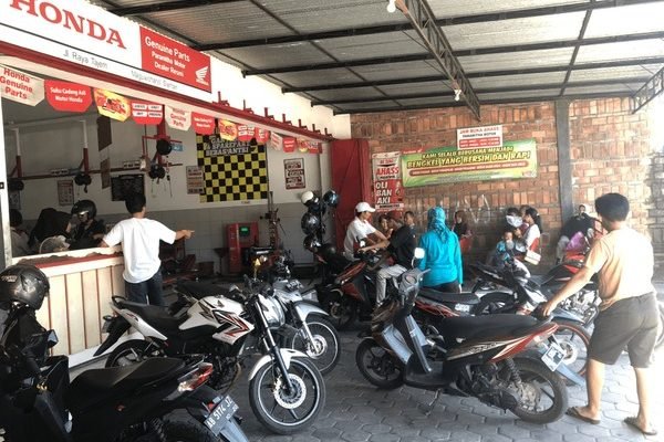 Ilustrasi bengkel motor/Foto : Dok. Shutterstock